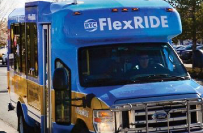 RTC FlexRIDE bus picking up a passenger.