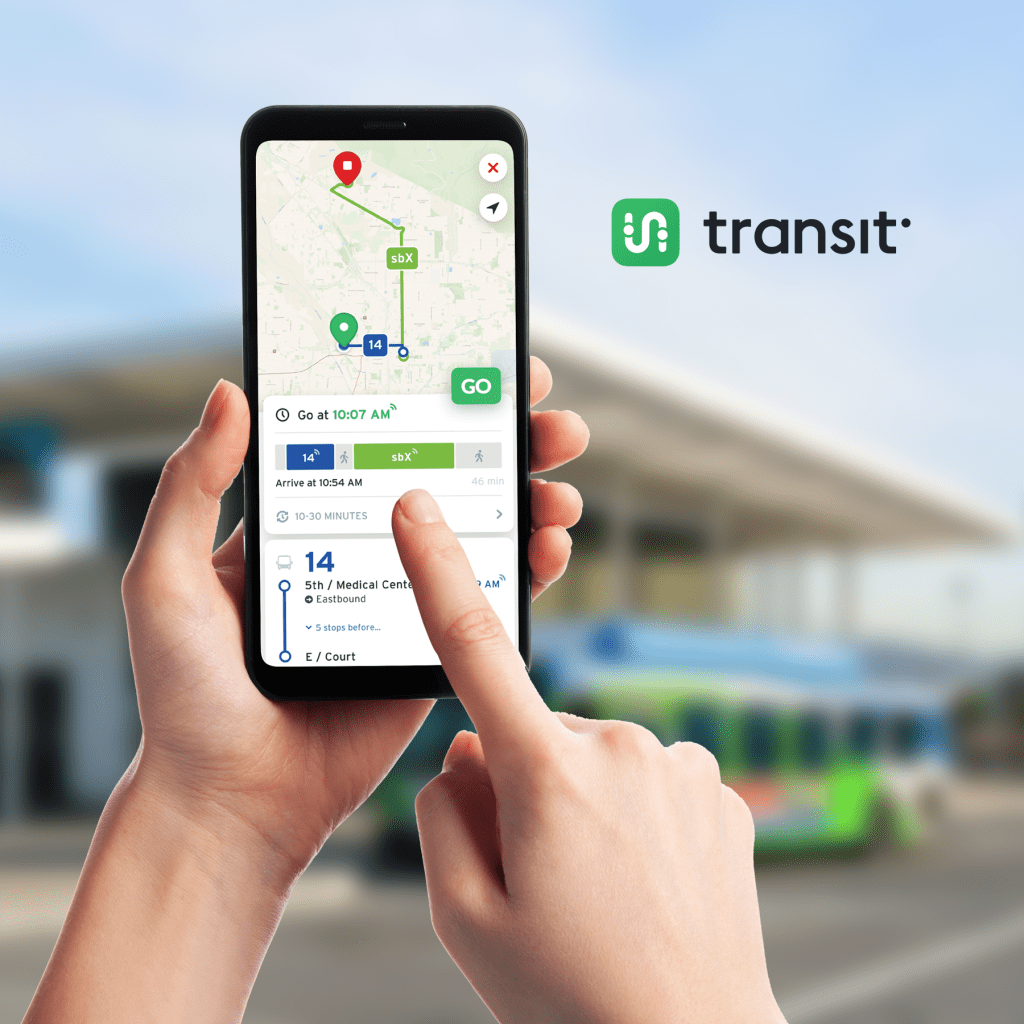 Transit App with someone holding a phone and showing their screen