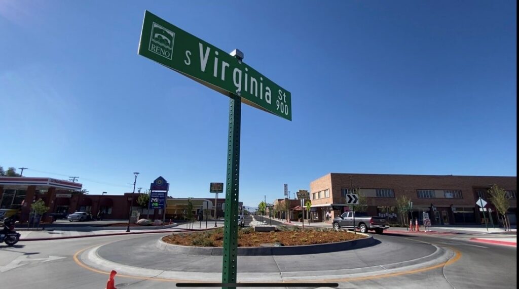 Virginia Street Roundabout with metal artwork in the center with roadway sign
